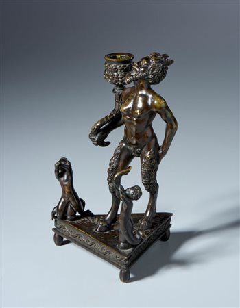  
Candeliere con satiro e tritoni. Severo Calzetta da Ravenna (Ravenna,  1465-1543) Bottega di. XVI-XVII secolo. Bronzo, patina trasparente dorata con tracce di patina nera 
 cm 23 x 13,5 x 12 