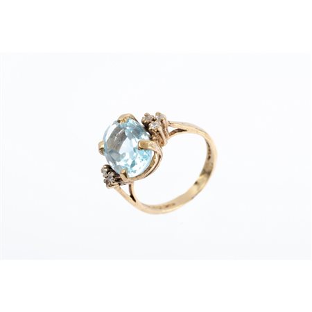 ANELLO in oro giallo 18 KT con brillanti e quarzo azzurro