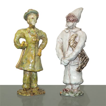Coppia di figurine in maiolica