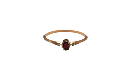 Bracciale rigido in oro basso con centrale in granato e microperle