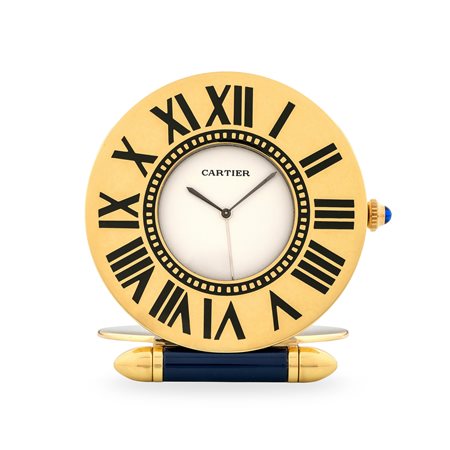 Cartier, Orologio da viaggio 'Obus' in ottone dorato e smalto con indicazione...