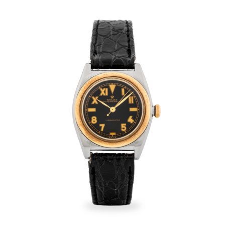 Rolex, Oyster Perpetual Ovetto ref. 3133 in acciaio e oro giallo 18k,...