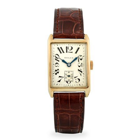 Rolex, Orologio Art Decò ref. 556 in oro giallo 9k, quadrante argentè con...