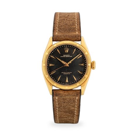 Rolex, Oyster Perpetual Ovetto ref. 6085 in oro giallo 18k, quadrante nero...