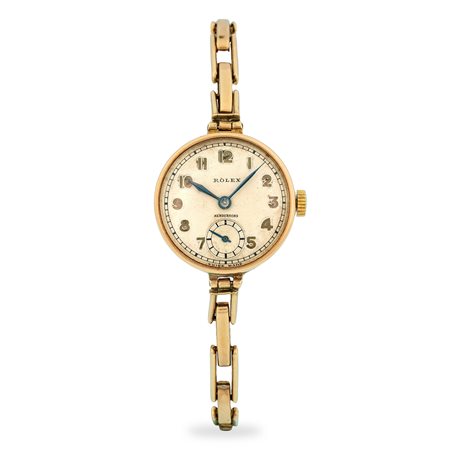 Rolex, Solo tempo in oro rosa 9k, quadrante argentè firmato 'Hendersons' con...
