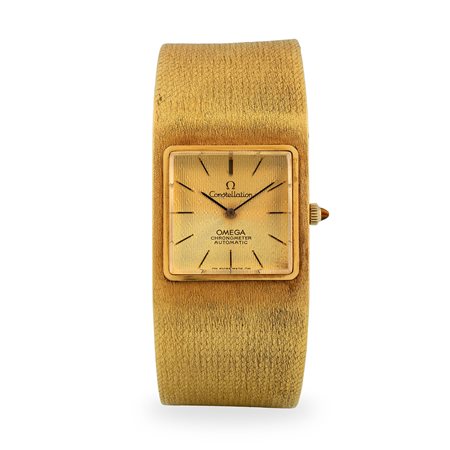 Omega, Constellation in oro giallo 18k con bracciale integrato, quadrante...