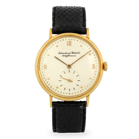 IWC, Calatrava in oro giallo 18k, quadrante argentè con numeri applicati e...