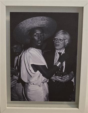 RON GALELLA, (1931-2022), Andy Warhol and Grace Jones attend the premiere...