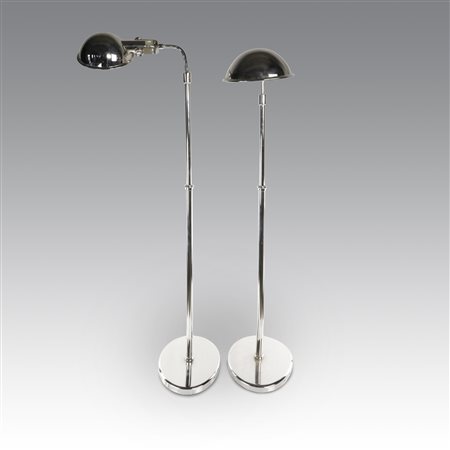  
Coppia di lampade da lettura Ralph Lauren in metallo cromato a forma di calotta 
  cm 144x47; cm 136x47