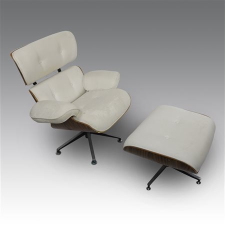 Charles & Ray Eames (disegno di)  
Poltrona e poggiapiedi, produzione Italia fine anni '80
 