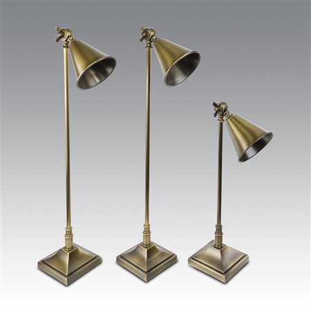 Celeste Dell'Anna (disegno di)  
Tre lampade color ottone 
 cm 74x24; cm 53x24