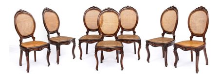  
Gruppo di sette sedie in paglia di Vienna Italia, XIX secolo
 Altezza x larghezza x profondità: 105 x 49 x 49 cm. Altezza seduta: 45 cm.