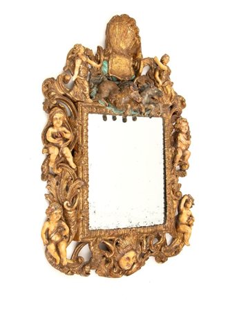  
Specchiera intagliata e dorata Sicilia, metà del XVIII secolo
 Altezza x larghezza x profondità: 72 x 46 x 12 cm