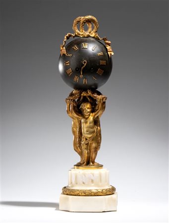 ALFRED DAUBRÉE (NANCY, 1817 - 1885) 
Orologio "Pendule au Globe" da tavolo in bronzo dorato in stile Luigi XVI Francia, XIX secolo
 Altezza x diametro: 43 x 13 cm 