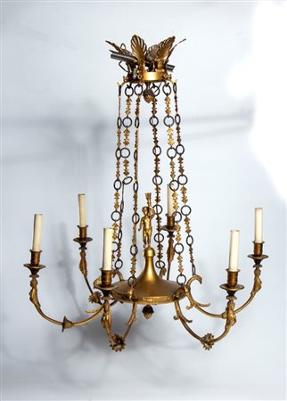  
Lampadario in bronzo dorato stile Impero Francia, XIX secolo
 Altezza x diametro: 80 x 65 cm