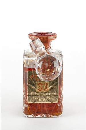 Macallan  
Macallan 33 Years Old Decanter Anni 70
43% vol 1 BT 75 cl