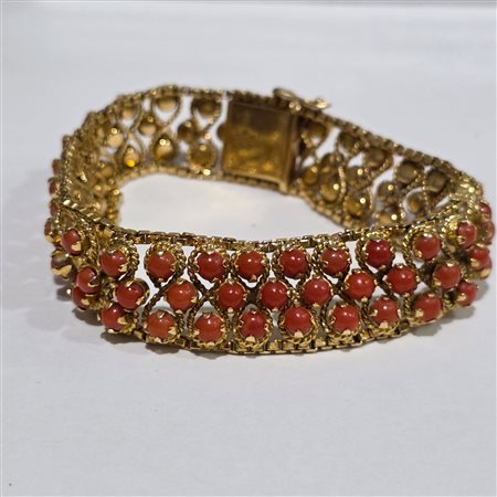 Importante bracciale in oro giallo 18 carati e corallo