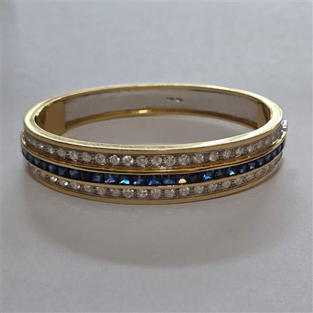 Importante bracciale in oro 18 carati, diamanti e zaffiri