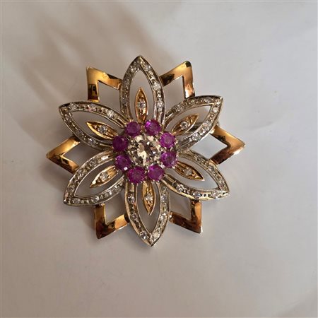 Importante spilla in oro 18 carati brillanti e rubini