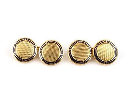 BULGARI Coppia di gemelli da polso in oro e smalto Di forma rotonda n oro...
