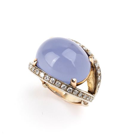 Anello in oro con diamanti e crisopazio In oro bianco 18k, incastonato con...