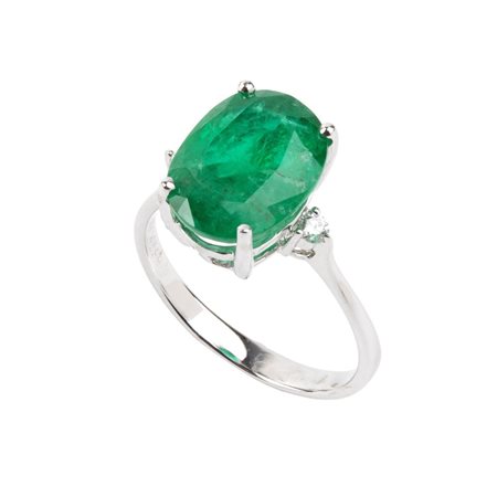 Anello in oro con smeraldo e diamanti In oro bianco 18k, incastonato con...