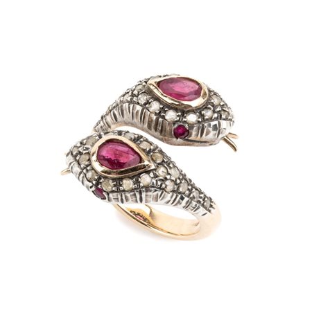Anello "serpenti" in oro ed argento con rubini Birmani e diamanti In argento...