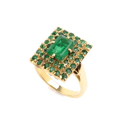 Anello in oro con smeraldi In oro bianco 18k, incastonato con centrale...