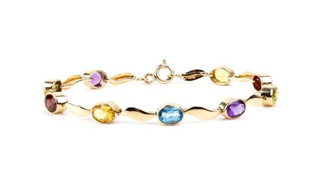 Bracciale in oro con pietre di colore Maglie con motivo a foglia in oro...