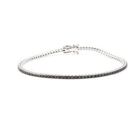 Bracciale tennis in oro con diamanti neri In oro bianco 18k, incastonato con...