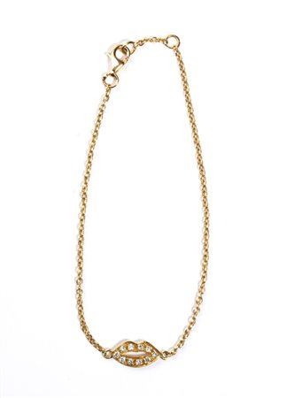 Bracciale in oro e diamanti in oro giallo 18k, raffigurante la sagoma...