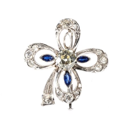 Spilla floreale in oro con diamante e zaffiri In oro bianco 18k, raffigurante...