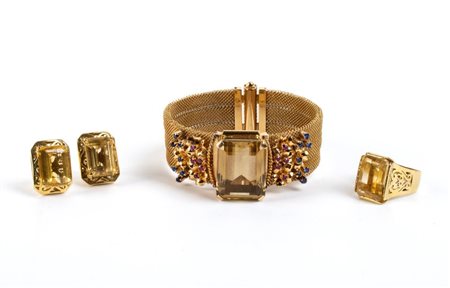 Parure in oro e pietre in oro giallo 18k, il lotto è composto da: un...