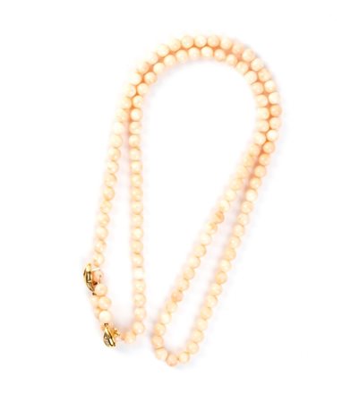 Collana in corallo oro e diamanti Ad un filo di sfere di corallo rosa...
