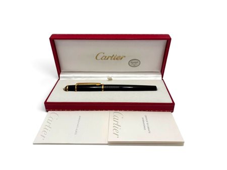 CARTIER Diabolo: penna a sfera corpo in metallo dorato e lacca nera,...