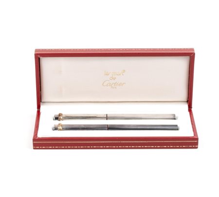 CARTIER Coppia di penne composto da una penna stilografica e una penna a...