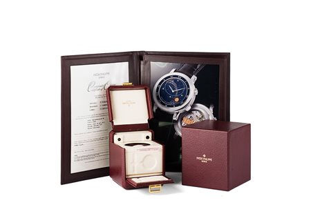 PATEK PHILIPPE Custodia portaorologio in pelle con finiture in ottone...