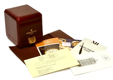 PATEK PHILIPPE Custodia portaorologio in pelle con finiture in ottone...