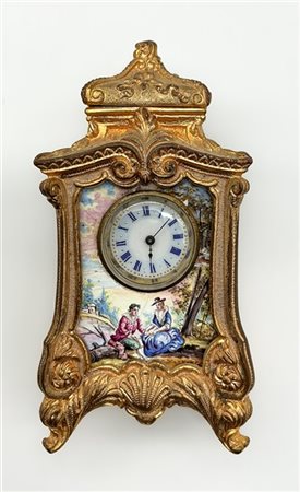 Piccolo orologio d'appoggio con cassa in bronzo dorato e smalti policromi a fig