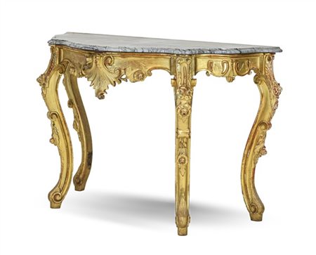 Console di forma mossa in legno intagliato e dorato con decoro a fiori e volute
