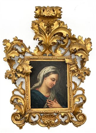 Cornice in legno intagliato, traforato e dorato a volute fogliacee. Secolo XIX