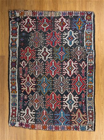 Tappeto Kilim, Caucaso, secolo XX. Decoro con file di piccoli medaglioni policr