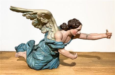 Scultura lignea raffigurante angelo in volo, dipinto in policromia. Italia sett