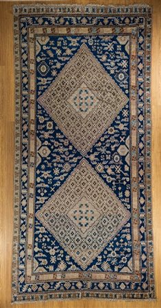 Tappeto Samarcanda, Turkestan orientale, secolo XX. Decoro con due grandi medag