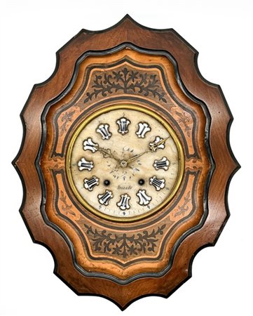 Orologio da parete del tipo ''occhio di bue'' in legno ebanizzato e intarsi in