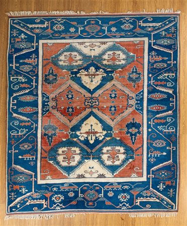 Tappeto Nepal, fine secolo XX. Decoro geometrico a riserve esagonali nei toni d