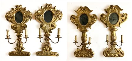 Lotto composto da due coppie di applique a due luci in legno intagliato e dorat