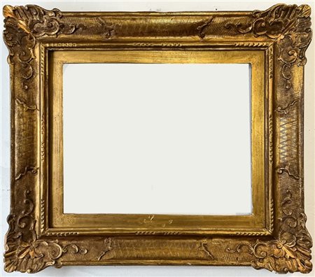 Cornice in legno intagliato e dorato, etichetta al verso "Cornici, bottega d'ar