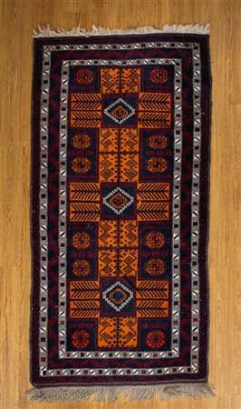 Tappeto Beluchistan, Persia, secolo XX. Decoro geometrico nei toni del marrone,
