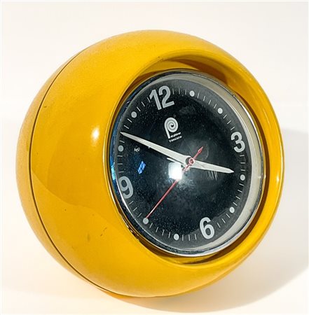 Explorer Transistor. Orologio da tavolo in materiale plastico giallo. Anni '70.